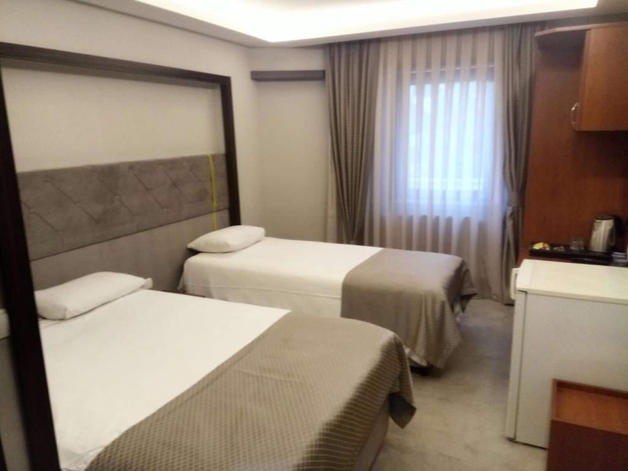 Gold City Hotel 伯萨 外观 照片